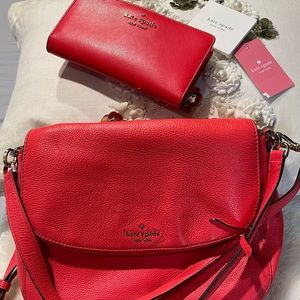 Kate Spade purse and matching wallet. Color is red with a pink undertone.